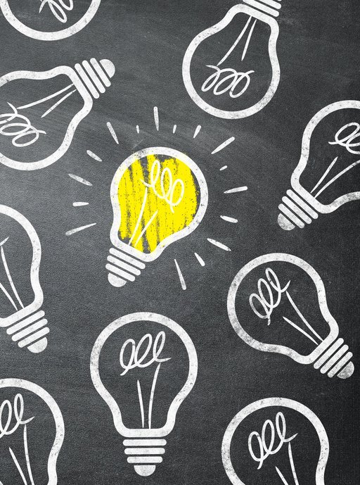 Auf schwarzen Untergrund wurden in weiß Glühbirnen gezeichnet. Eine Glühbirne ist gelb ausgefüllt