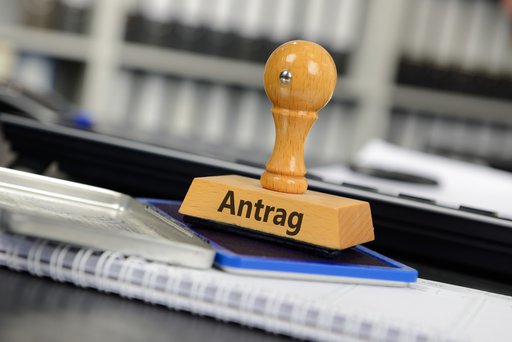 Stempel mit der Aufschrift "Antrag".