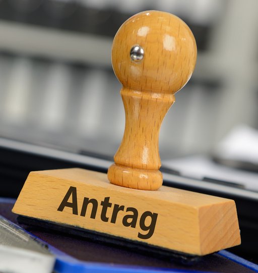 Stempel mit der Aufschrift "Antrag".
